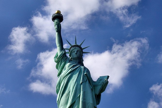 9/11 Memorial Statue of Liberty & Ellis Island Guided Tour Option - What the guide adds, and where the risk lies