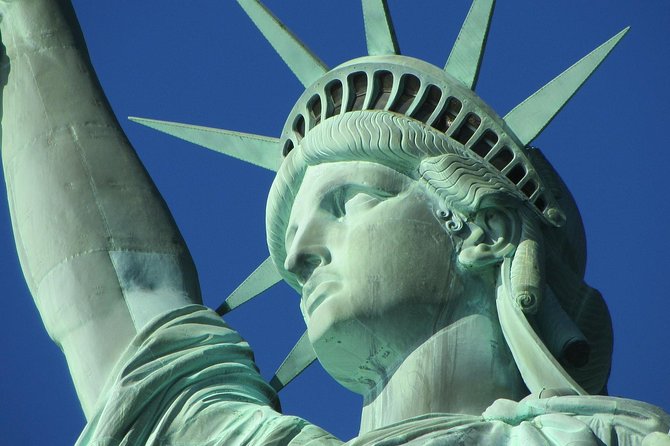 9/11 Memorial Statue of Liberty & Ellis Island Guided Tour Option - Walking, weather, food, and family comfort