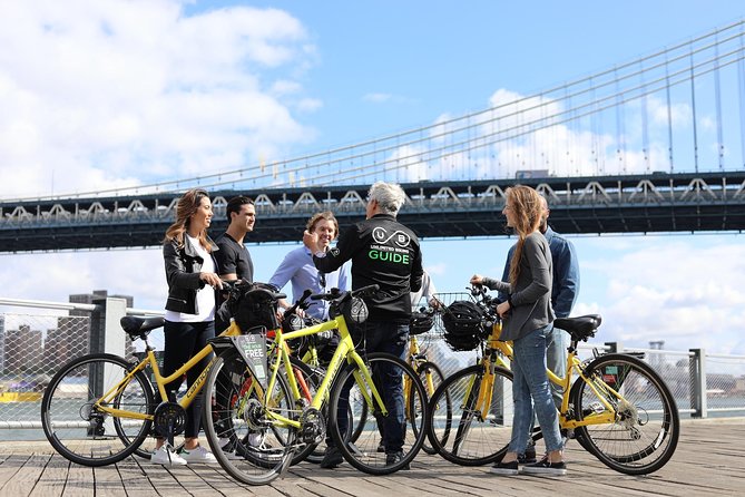 Brooklyn Bridge and Waterfront 2-hour Guided Bike Tour - Crossing Brooklyn Bridge with the city below