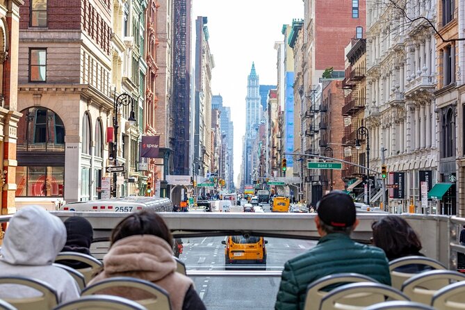 Express Sightseeing Bus Tour with Statue of Liberty Cruise Combo - Wall Street, Trinity Church, and the harbor approach
