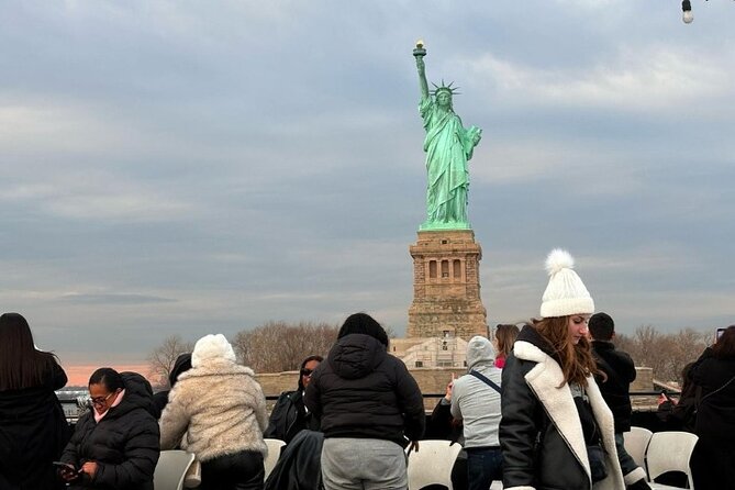 Express Sightseeing Bus Tour with Statue of Liberty Cruise Combo - Lady Liberty, Ellis Island, and the skyline from the water