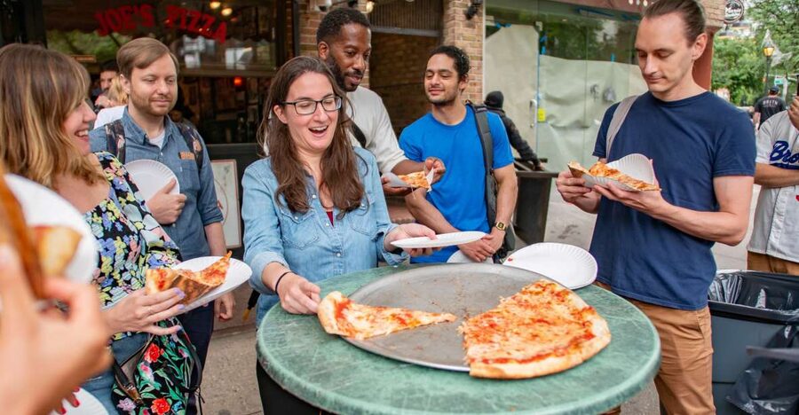 Greenwich Village NYC Pizza Walking Tour - Walking through a former Little Italy