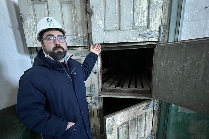 Hard Hat Tour of the Abandoned Ellis Island Hospital Complex - JR’s Unframed installation inside the ruins