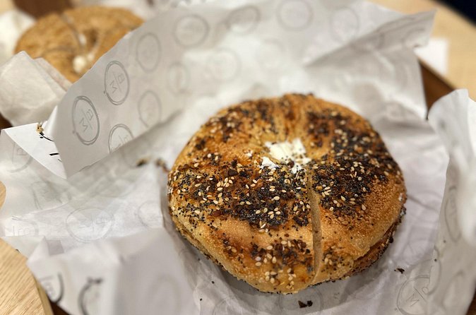Iconic NYC Breakfast Food & Landmark Tour: Coffee, Bagel, Donut + - Bagels and lox at Bagel Market