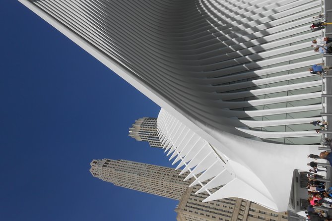 Lower Manhattan Self-Guided Walking Tour and Scavenger Hunt - The Brooklyn Bridge appears without a bridge crossing