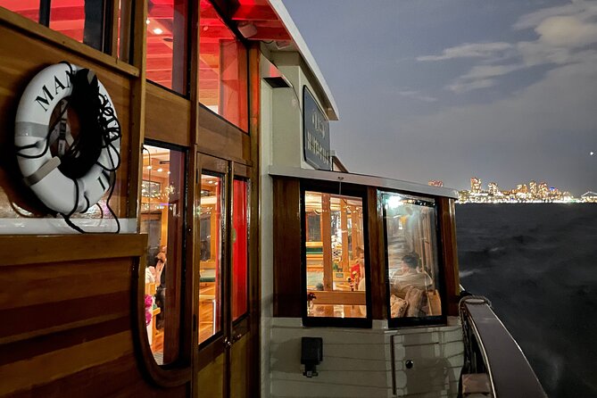 New York City Bright Lights Skyline Cruise on Yacht - The Statue of Liberty after dark