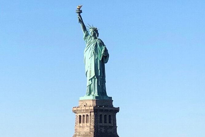 New York City bus and boat tour - Starting in Midtown with Times Square and classic landmarks