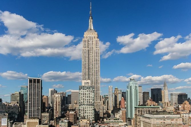 New York Tour by Subway and Bus with Private Guide - The Flatiron Building adds a compact architectural stop