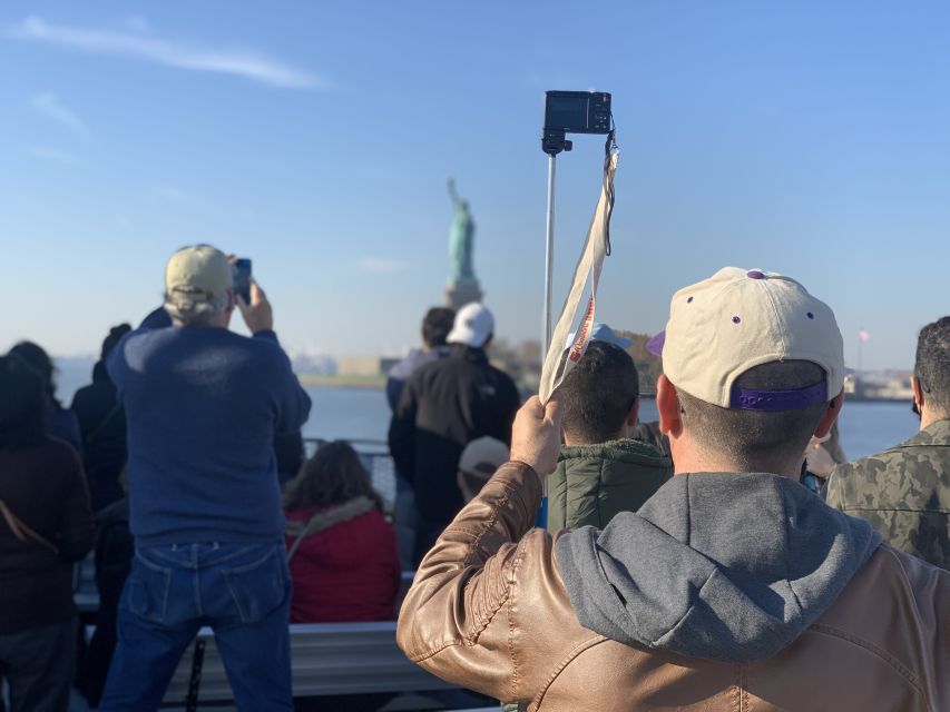 NYC: 9/11 Memorial, Wall Street, and Statue of Liberty Tour - Battery Park and the ferry crossing