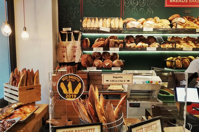 NYC Food Tour: NoMad & Flatiron by Like A Local Tours - The Flatiron Building is a photo stop with real context