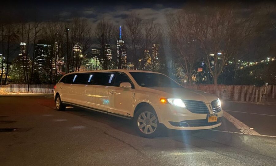NYC Limousine Tour By Stretch Limo-King And Queen Limo NYC - Times Square with a glass of champagne