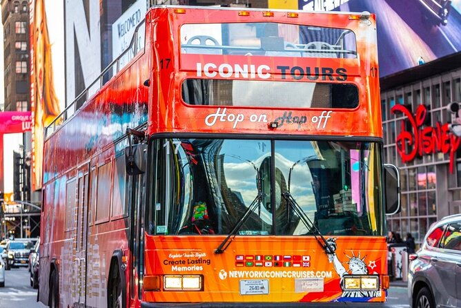 NYC Night Bus Sightseeing Tour with Free Statue of Liberty Cruise - Rockefeller Center, SoHo, and Chinatown