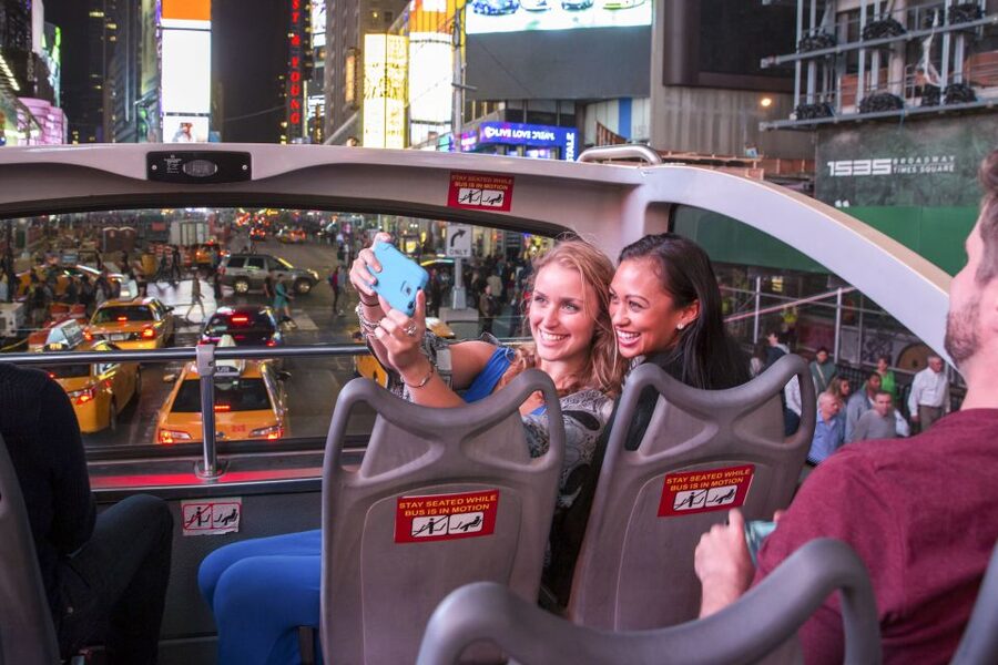 NYC: Sightseeing Night Tour by Open-Top Bus with Live Guide - New York after dark, from the top deck