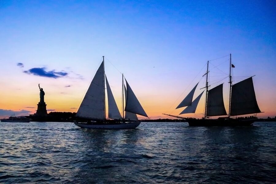 NYC: Statue of Liberty Day Sail with Onboard Bar - Helping with the sails and taking the helm