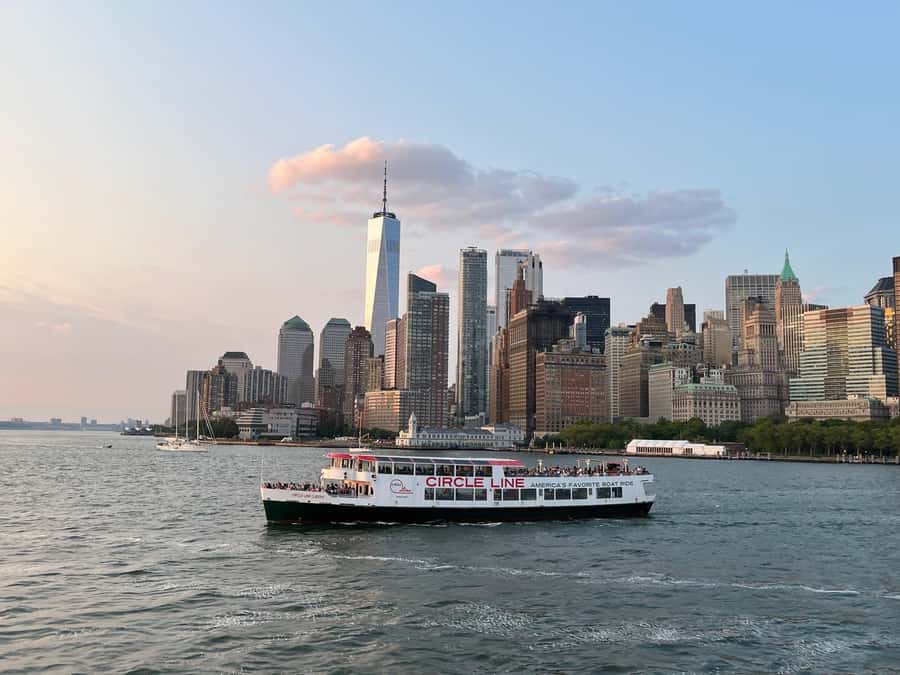 NYC: Statue of Liberty Sunset Cruise Skip-the-Line Ticket - Watching New York turn on its lights