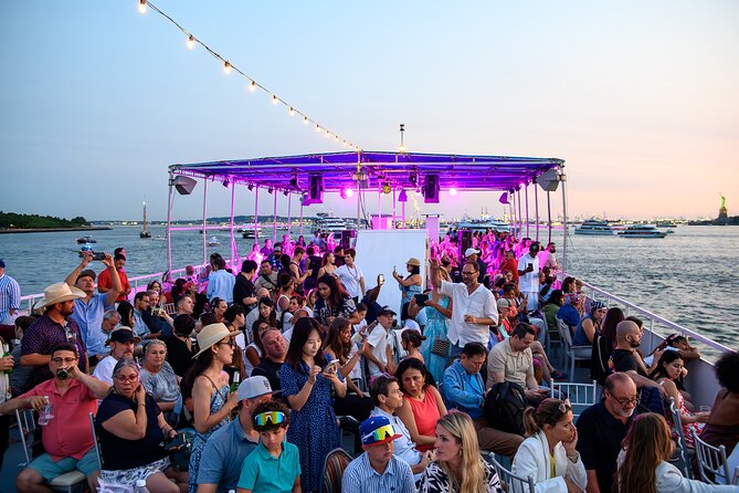 NYC Sunset Cruise with DJ, Skyline & Statue of Liberty - Passing under the Brooklyn Bridge