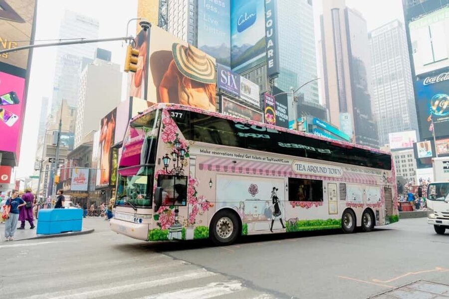 NYC: Tea Around Town Bus Tour with Live Entertainment - Three Midtown landmarks, three quick views