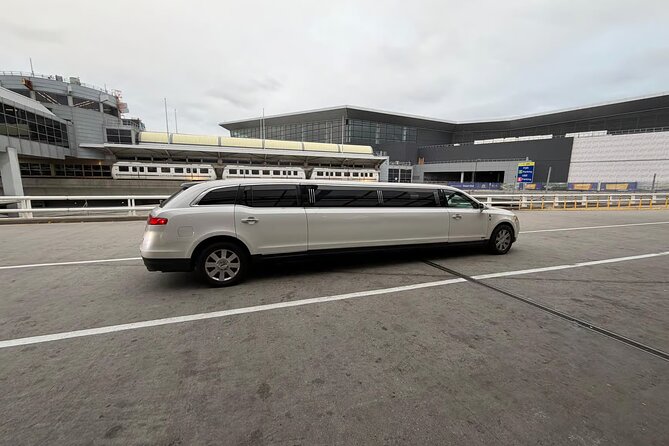 NYC VIP Private Luxury airport arrival ride by Stretch Limousine - From airport arrivals hall to New York City streets