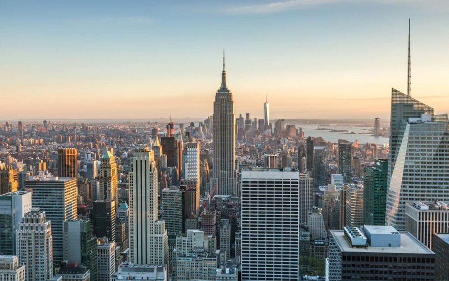 NYC: Walking Tour with Local Guide and 30+ Top NYC Sights - Meeting Wall Street and the beginnings of New York