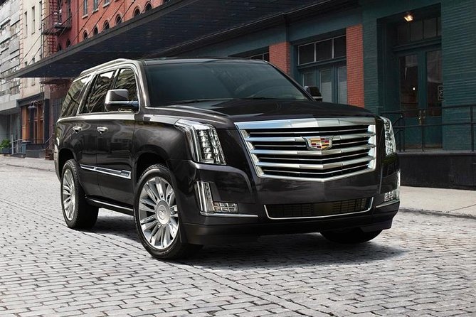 Private Transfer: Newark Airport EWR to New York by Luxury SUV - Leaving Newark Airport with a name sign and a private car