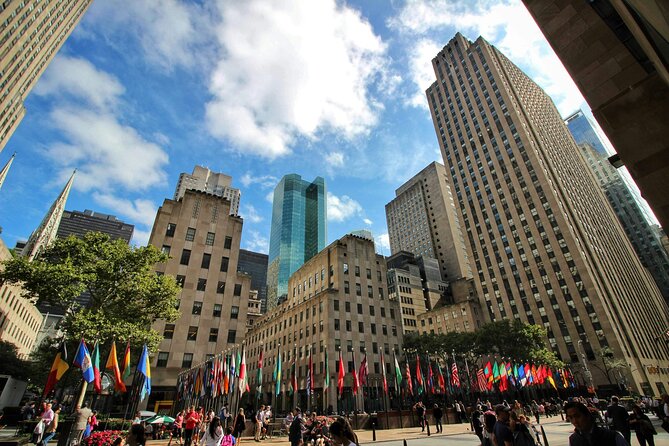 Rockefeller Center Walking Tour With Optional Top of the Rock - Bronze figures reveal Rockefeller Center’s visual code