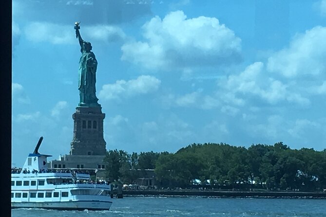 Statue of Liberty and Ellis Island Tour in Spanish - Timing, security, weather, and family comfort