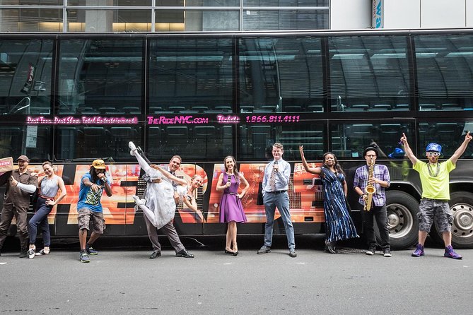 The RIDE Experience Theatrical Bus Tour - Five to seven performers outside the windows